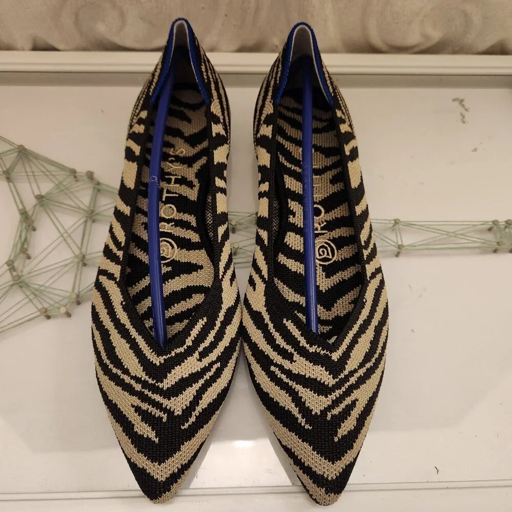 Rothy's Black/Cream Zebra Point toe flats. NWT. Size 6